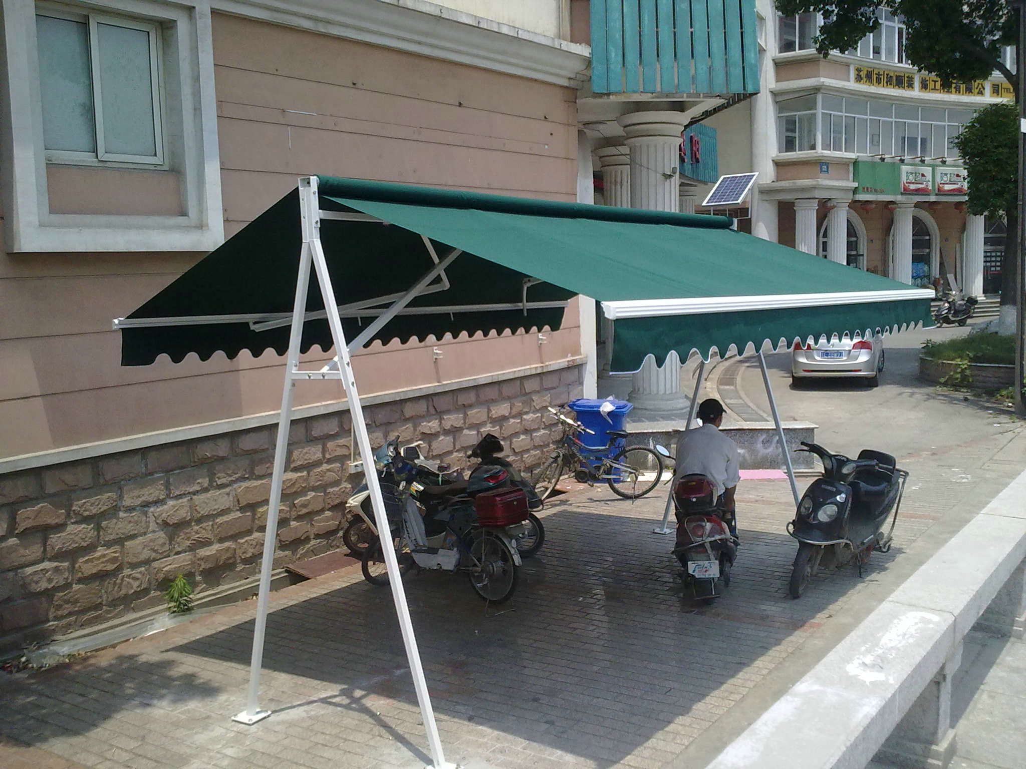 双开式电动伸缩雨篷